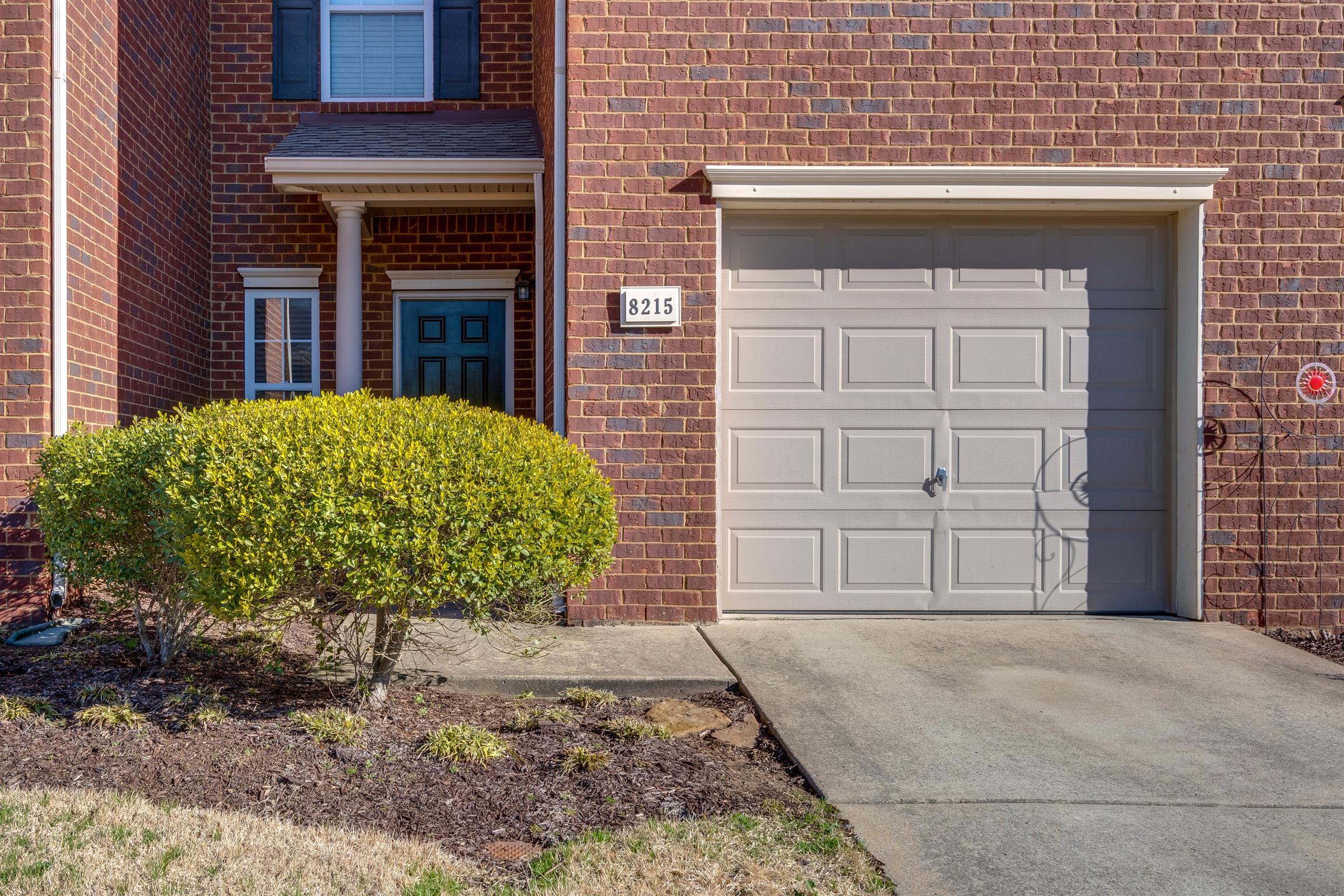 8215 Rossi Road Brentwood, TN 37027 - Photo 3 of 26 a view of a house with a yard
