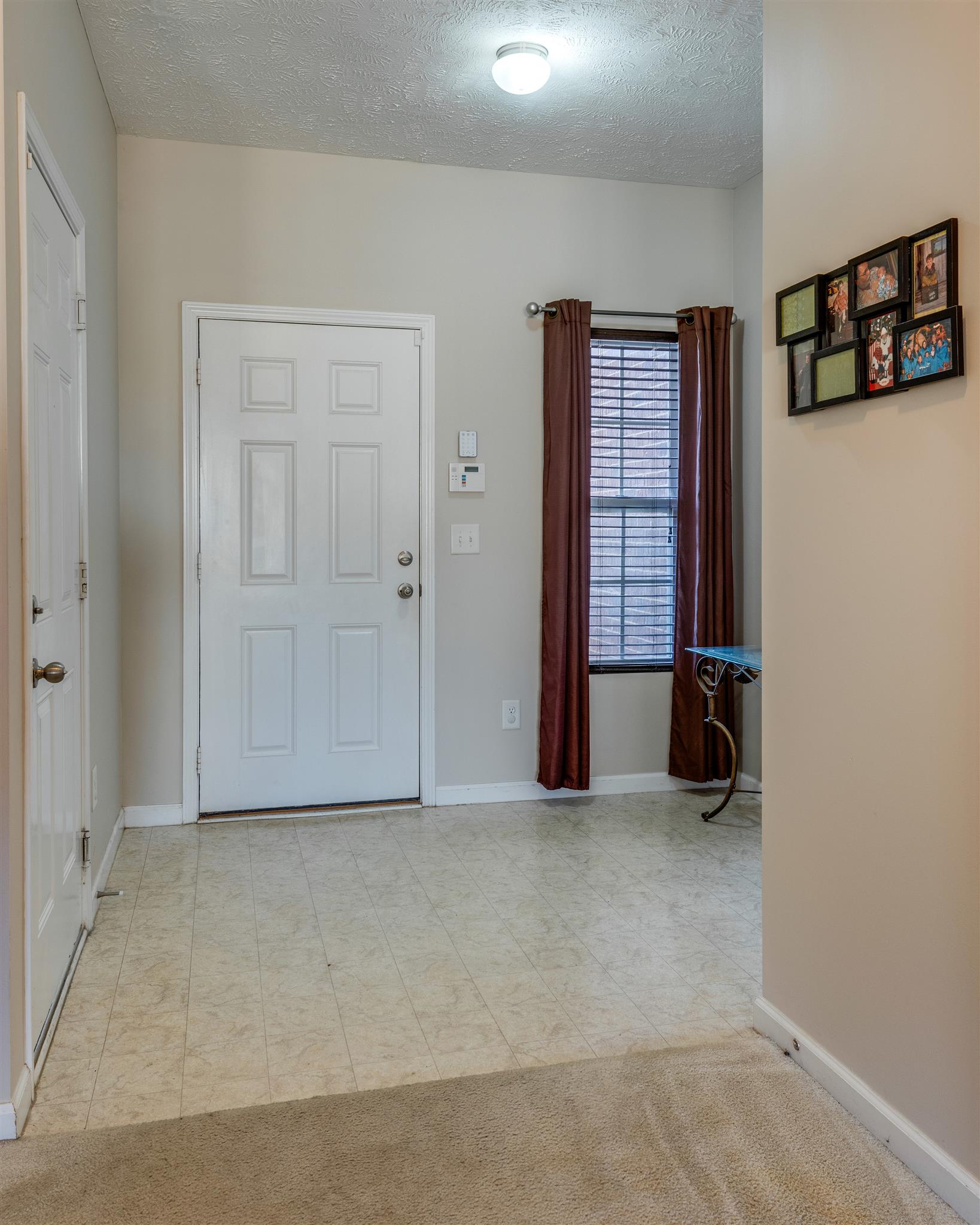 8215 Rossi Road Brentwood, TN 37027 - Photo 6 of 26 an empty room with windows