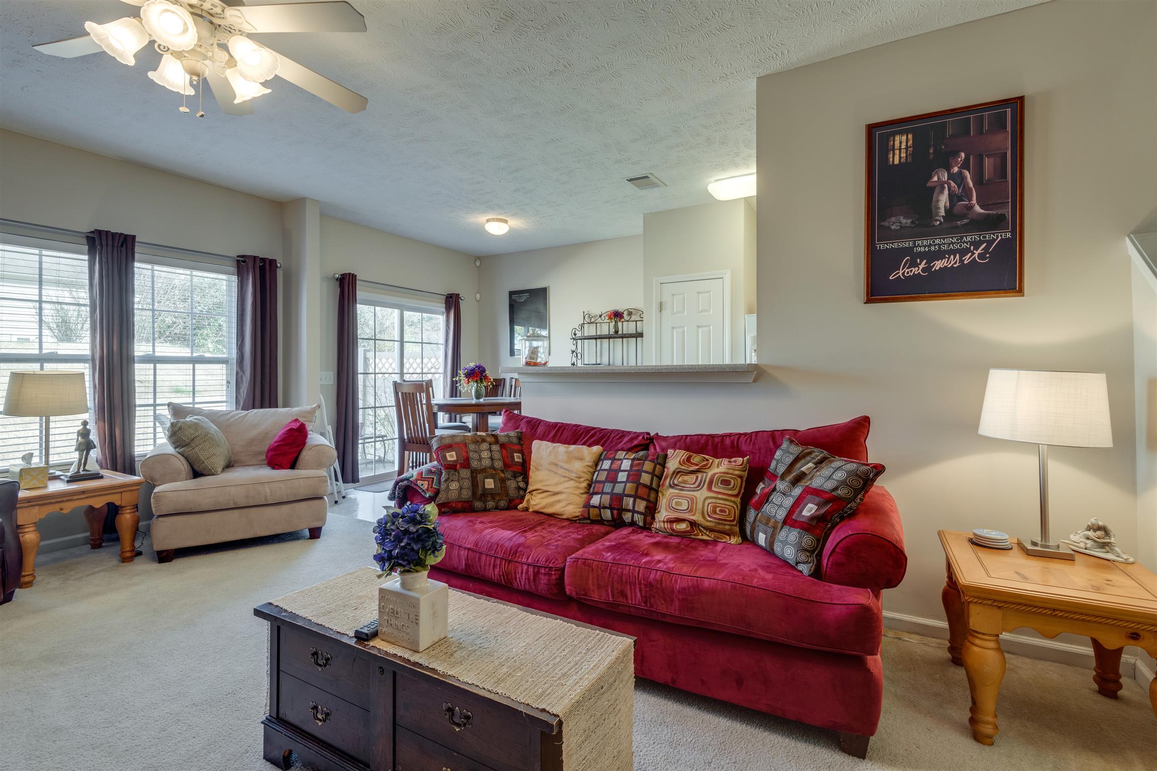 8215 Rossi Road Brentwood, TN 37027 - Photo 7 of 26 a living room with furniture and a couch