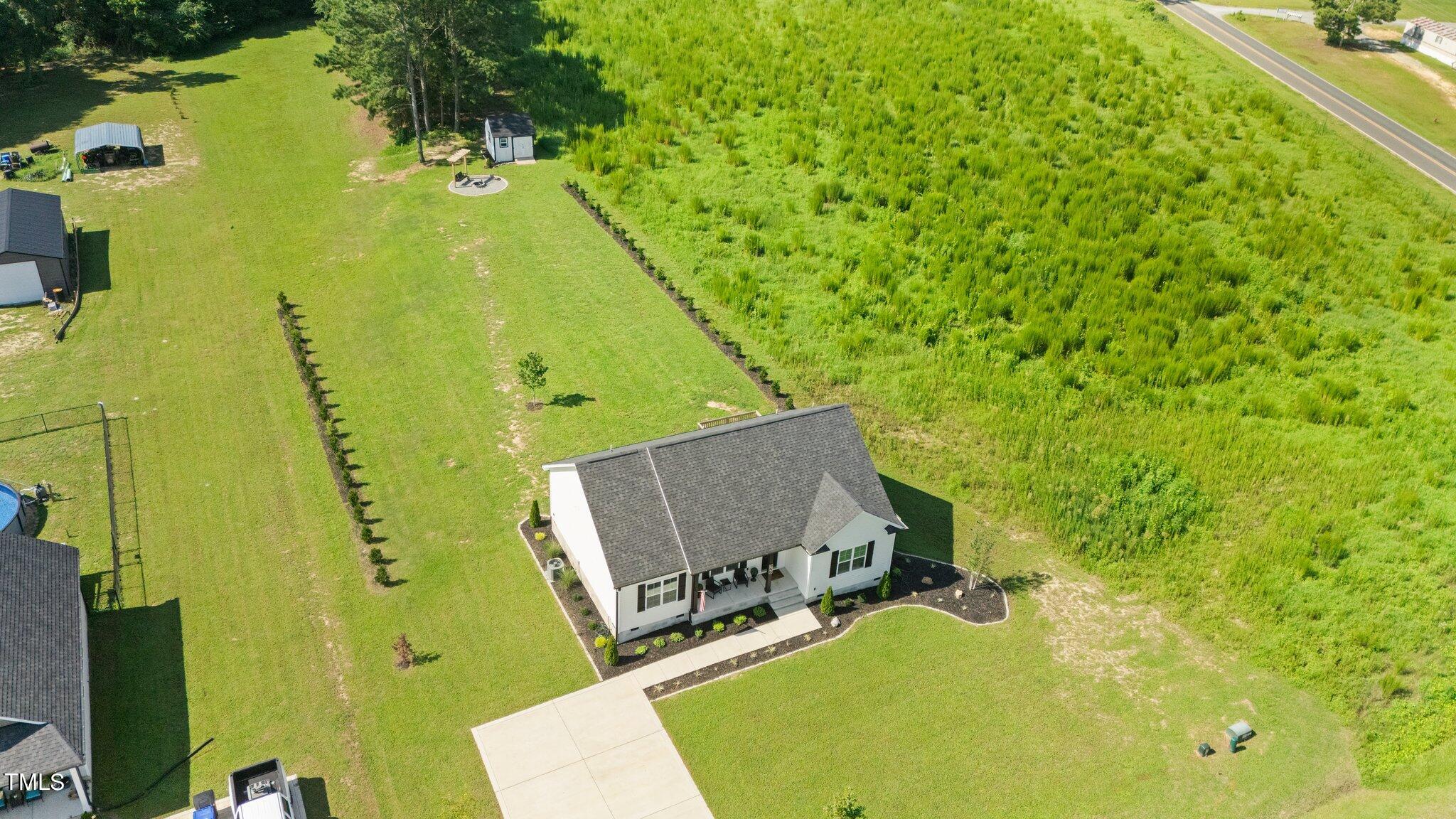 677 Tripp Road Lillington, NC 27546 - Photo 33 of 35 1-web-or-mls-DJI_20240802104153_0129_D