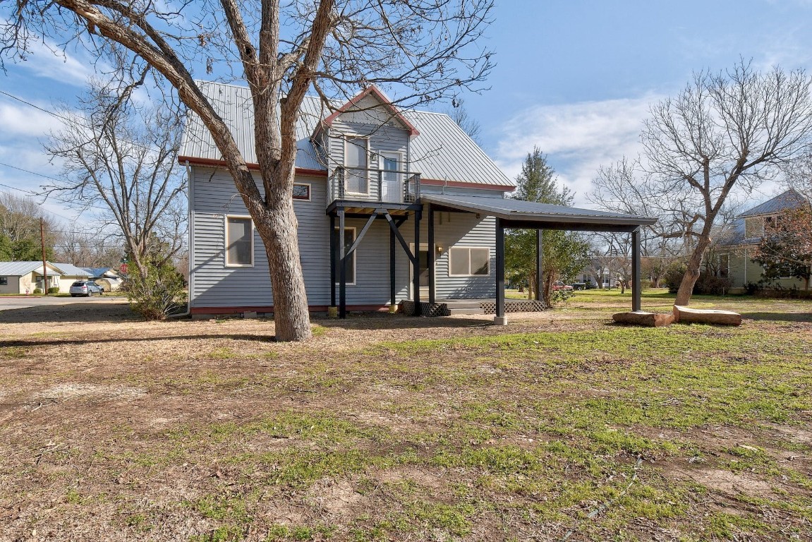 205 South Rio Grande Street Lockhart, TX 78644 - Photo 29 of 30 a view of a house with snow on the road