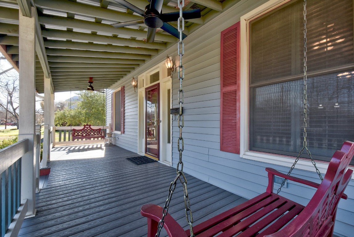 205 South Rio Grande Street Lockhart, TX 78644 - Photo 3 of 30 a view of a balcony with wooden floor