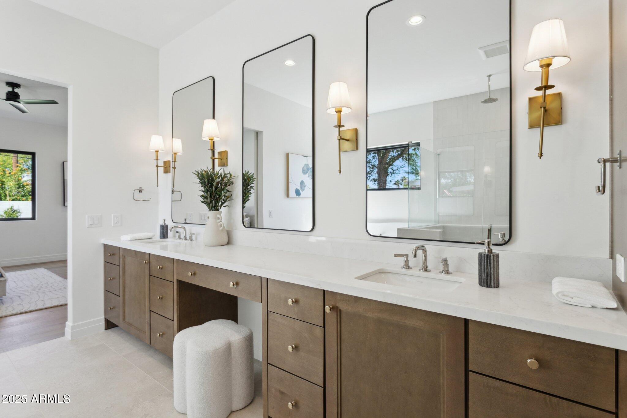 2942 North 47th Place Phoenix, AZ 85018 - Photo 19 of 40 a bathroom with a double vanity sink mirror and double