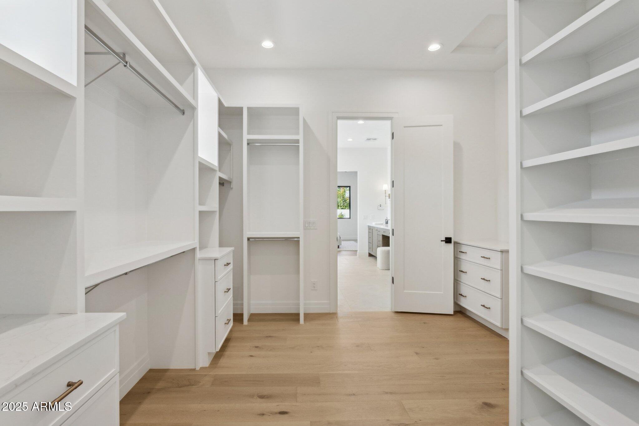 2942 North 47th Place Phoenix, AZ 85018 - Photo 22 of 40 a view of an empty walk in closet
