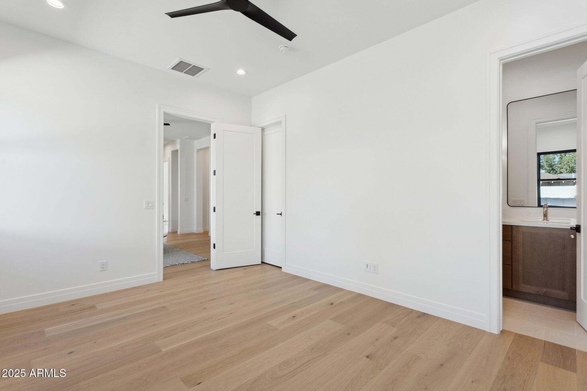 2942 North 47th Place Phoenix, AZ 85018 - Photo 29 of 40 a view of an empty room