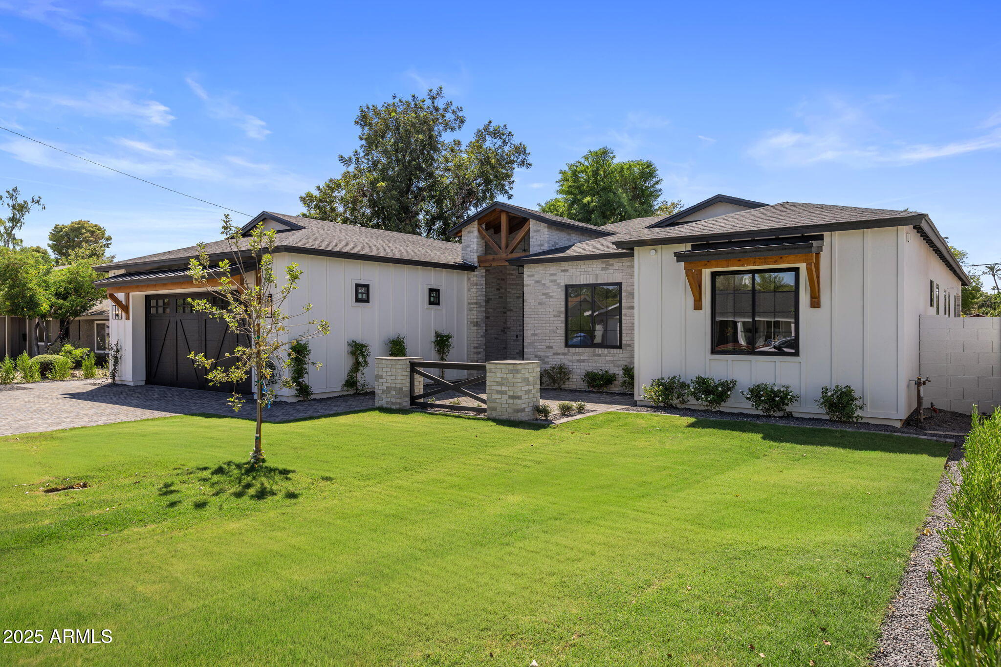 2942 North 47th Place Phoenix, AZ 85018 - Photo 3 of 40 a view of a house with backyard and sitting area