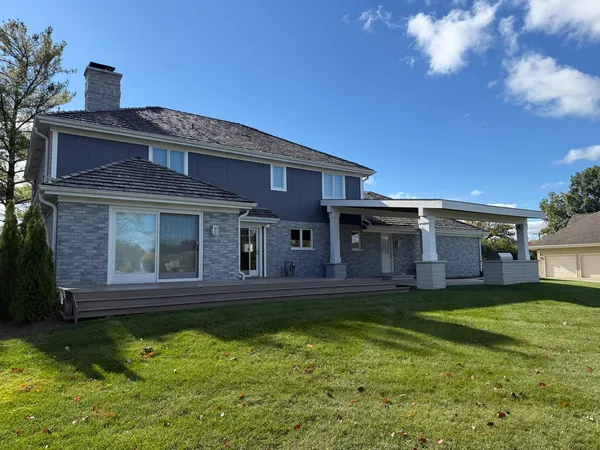 a view of a house with a big yard