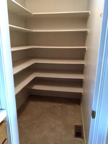 a utility room with cabinets
