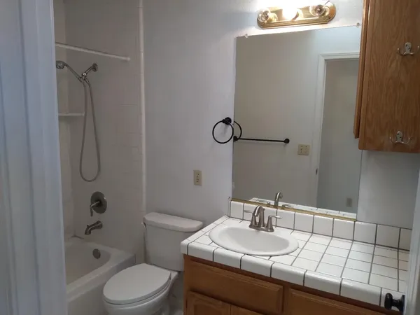 a view of room with stairs and a window