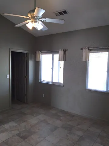 a view of an empty walk in closet
