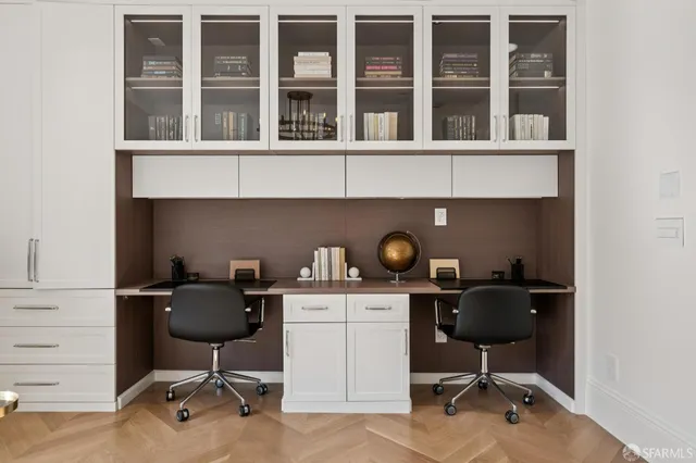 a kitchen with stainless steel appliances a sink and a large window