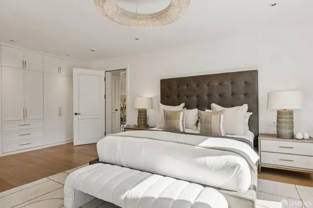 a kitchen with stainless steel appliances granite countertop a stove and a microwave