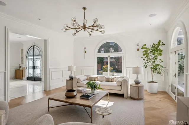 a kitchen with stainless steel appliances kitchen island granite countertop a sink and cabinets