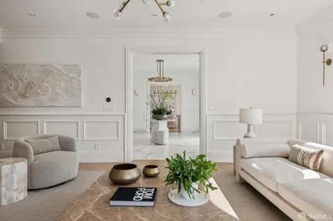 a bedroom with a bed and a table in it