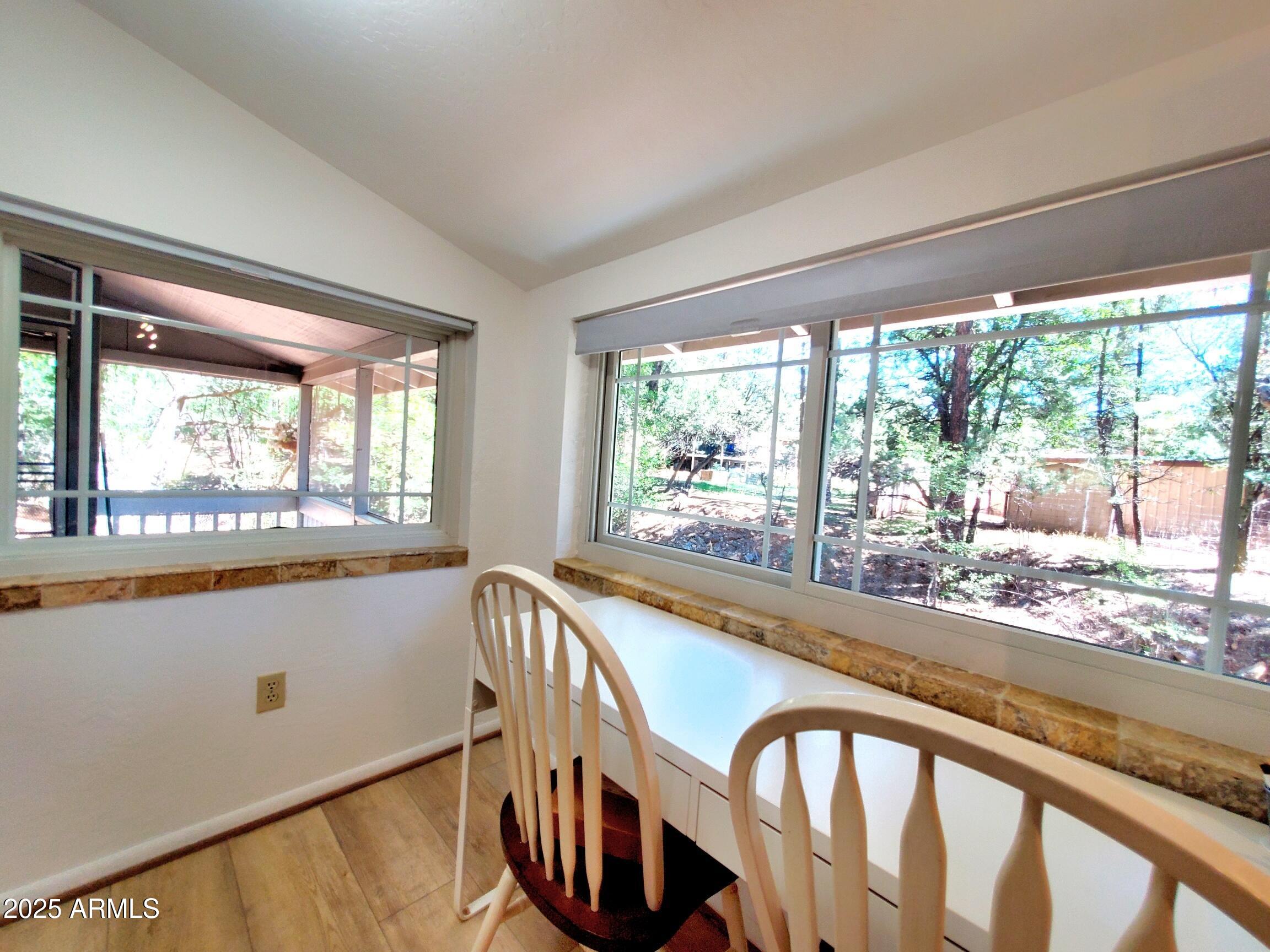 8449 Elk Road Pine, AZ 85544 - Photo 14 of 24 a view of a large window with an outdoor view