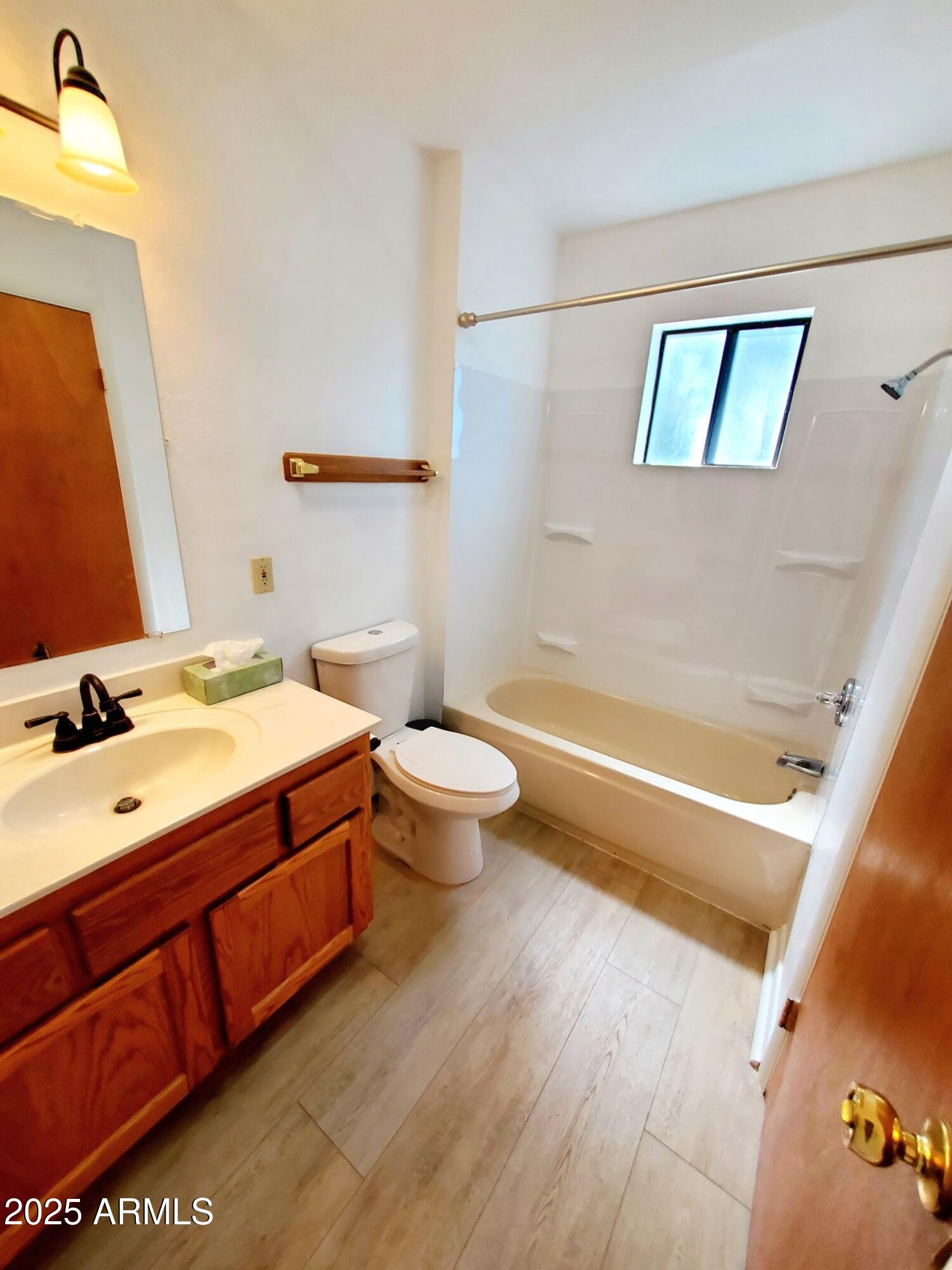8449 Elk Road Pine, AZ 85544 - Photo 17 of 24 a bathroom with a double vanity sink mirror and toilet