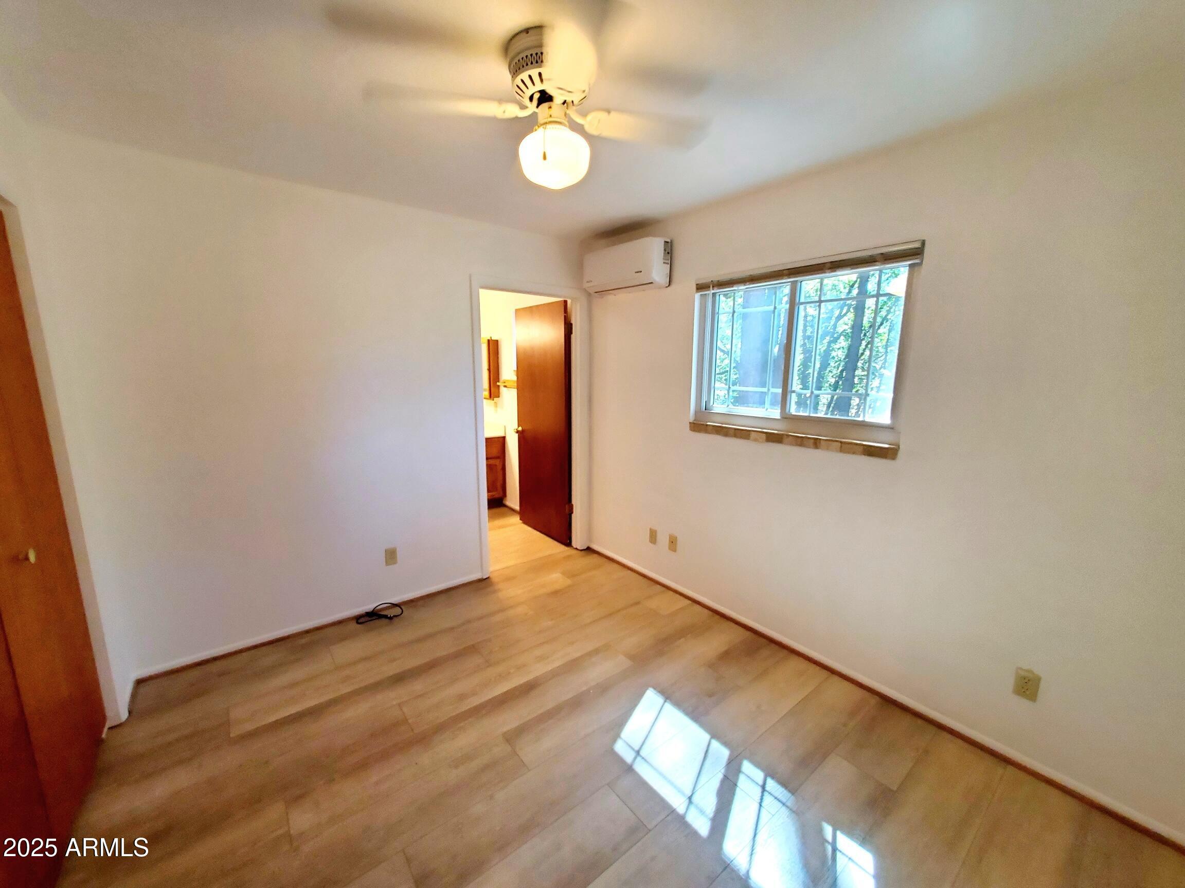 8449 Elk Road Pine, AZ 85544 - Photo 19 of 24 a view of an empty room with a window