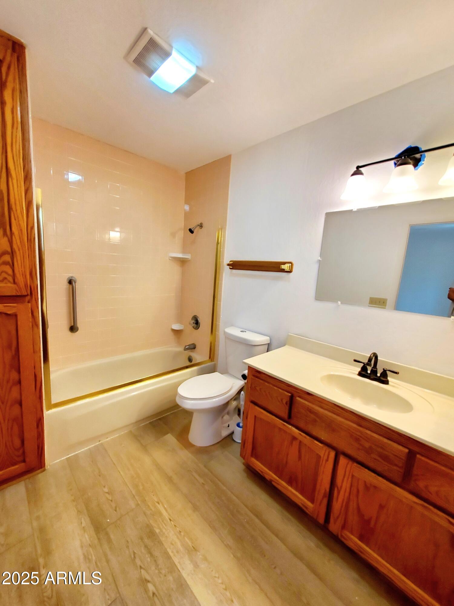 8449 Elk Road Pine, AZ 85544 - Photo 20 of 24 a bathroom with a sink and a mirror