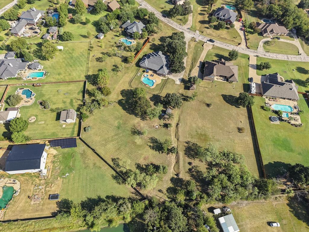 3600 Doris Walker Trail Burleson, TX 76028 - Photo 38 of 40 view of residential house with a swimming pool