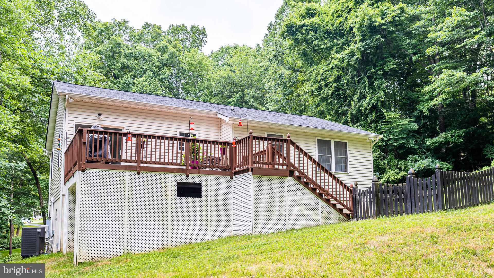 625 Carson Road Huntingtown, MD 20639 - Photo 19 of 21 a view of a house with a balcony