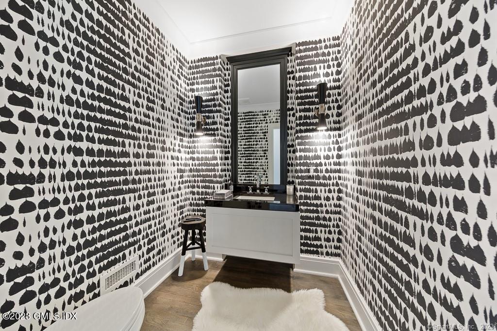 8 S Trail Darien, CT 06820 - Photo 20 of 38 a bathroom with a toilet and a shower curtain