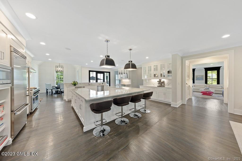 8 S Trail Darien, CT 06820 - Photo 4 of 38 a living room with furniture and a wooden floor