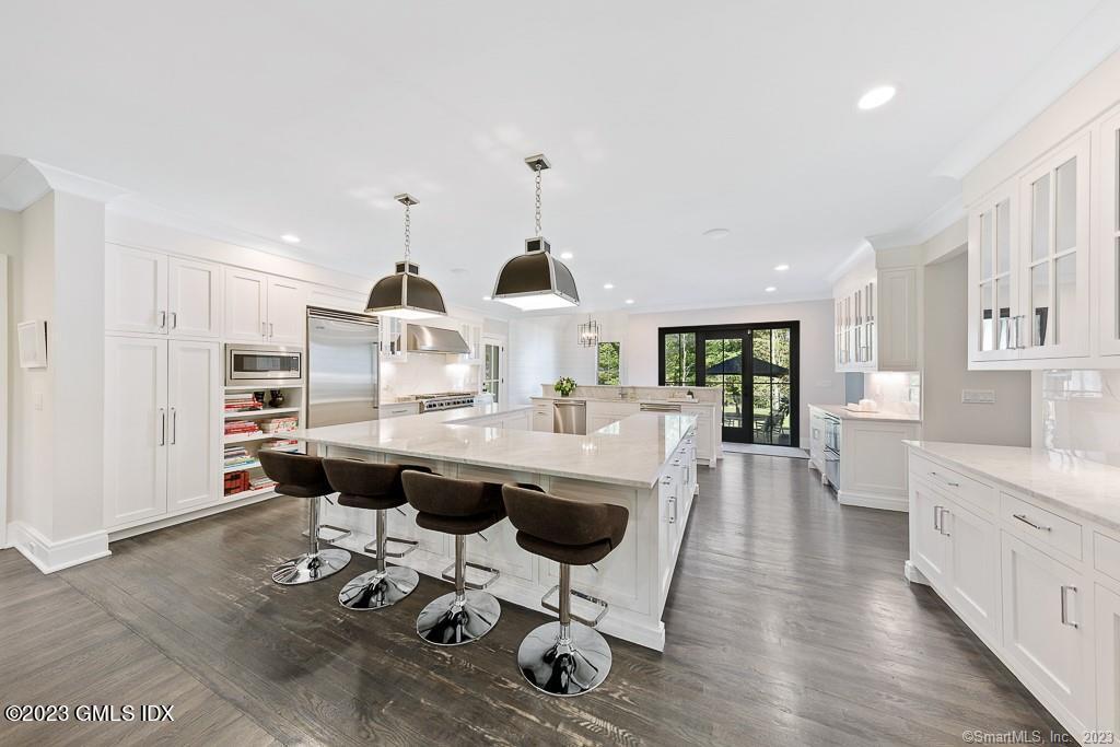 8 S Trail Darien, CT 06820 - Photo 9 of 38 a view of a dining room with furniture window and wooden floor