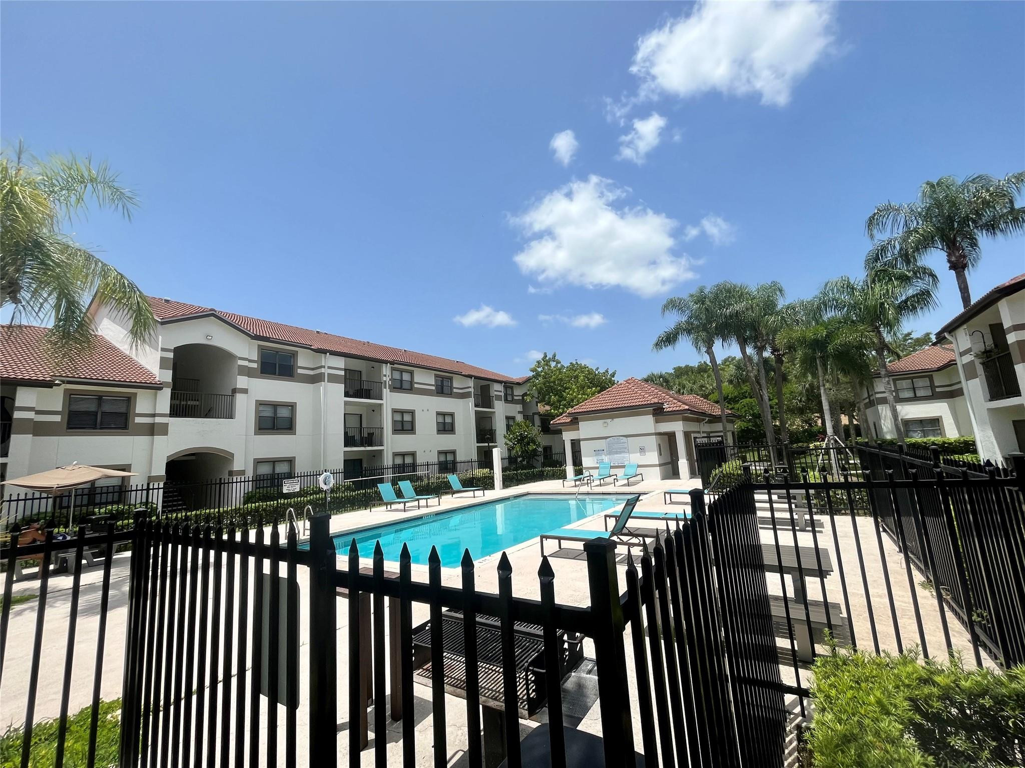 570 South Park Road, Unit 236 Hollywood, FL 33021 - Photo 35 of 36 a front view of residential houses with yard