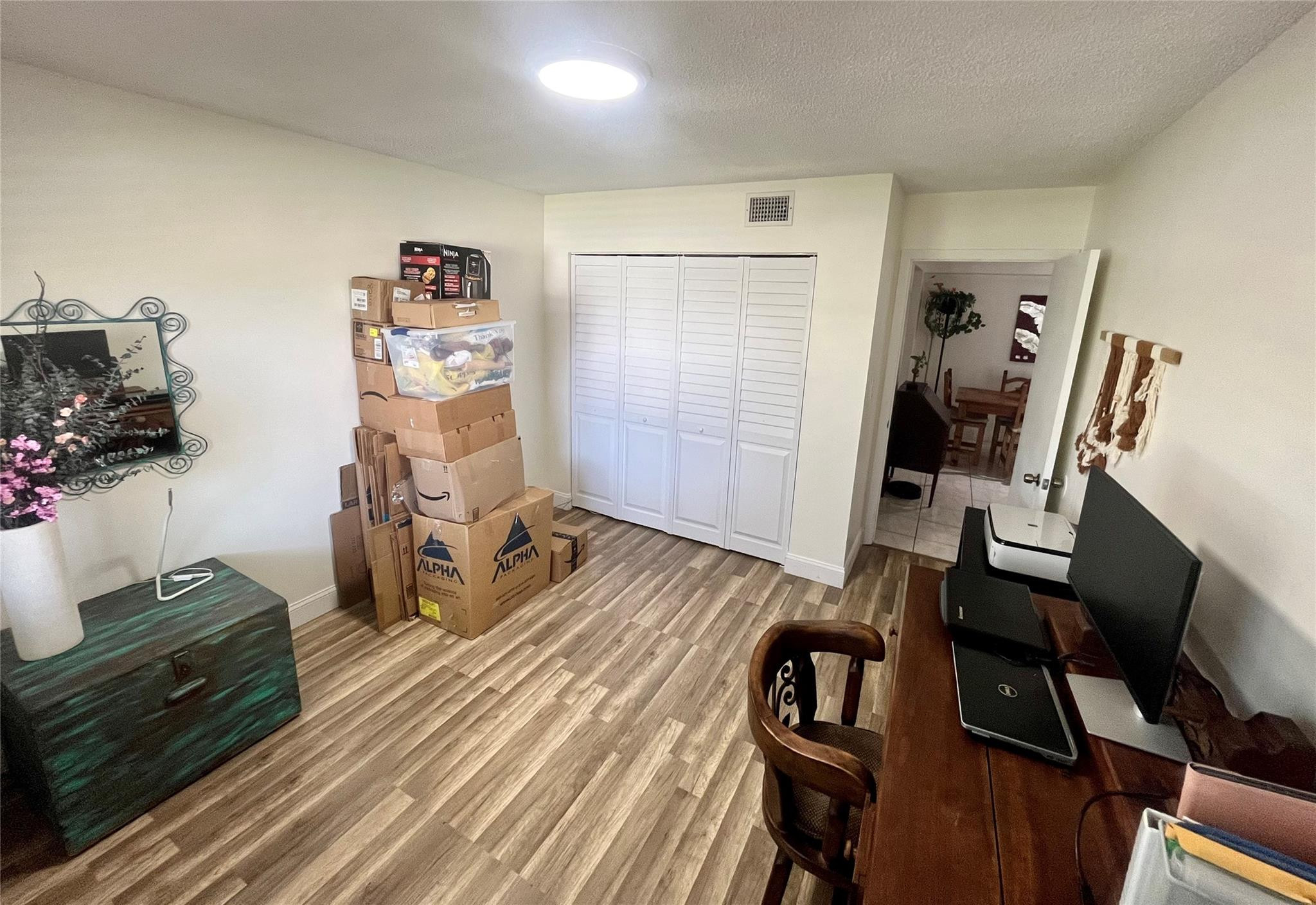 570 South Park Road, Unit 236 Hollywood, FL 33021 - Photo 8 of 36 a view of a workspace with furniture and wooden floor