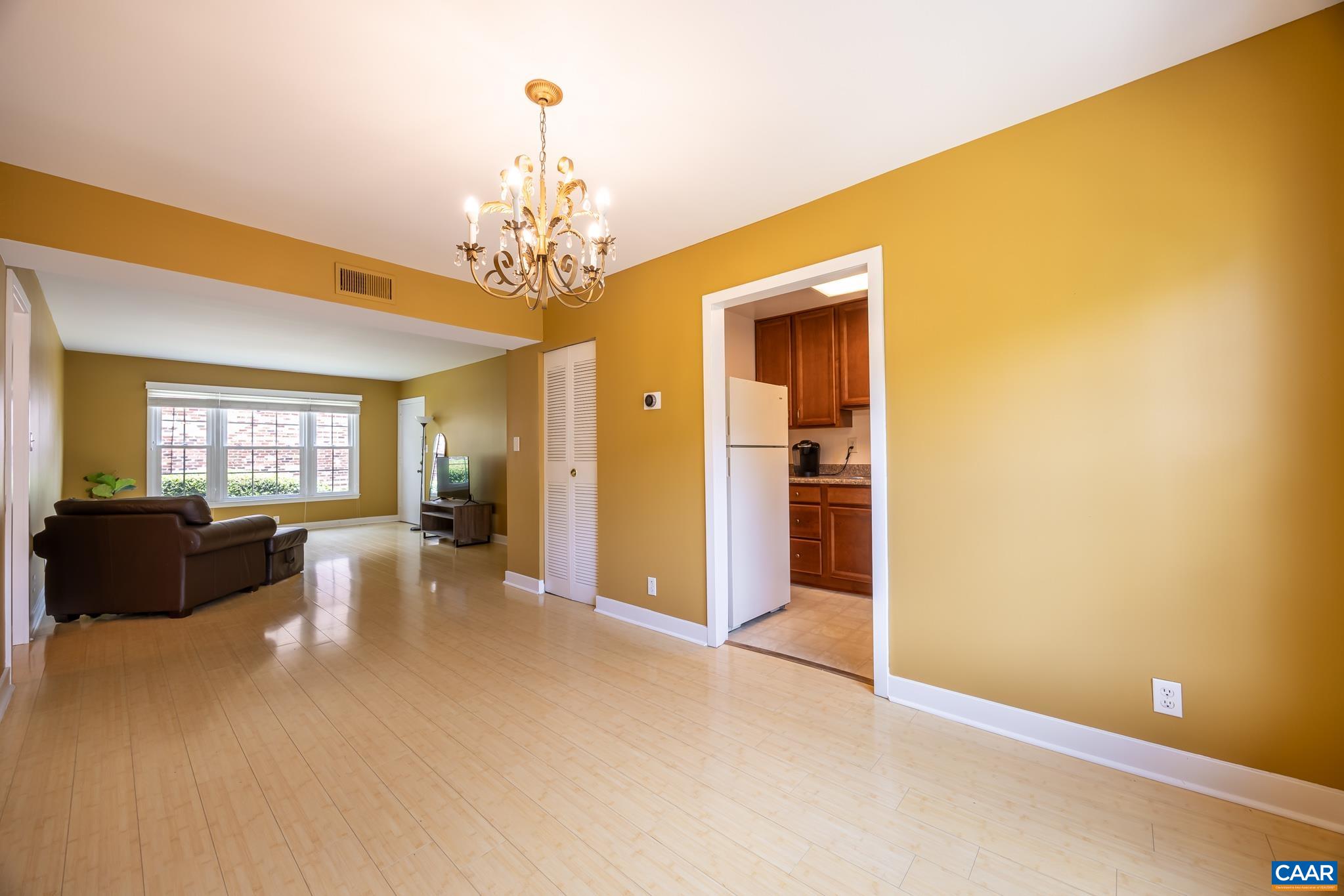 2527 Hydraulic Road, Unit 41 Charlottesville, VA 22901 - Photo 7 of 16 a view of a livingroom with furniture and windows