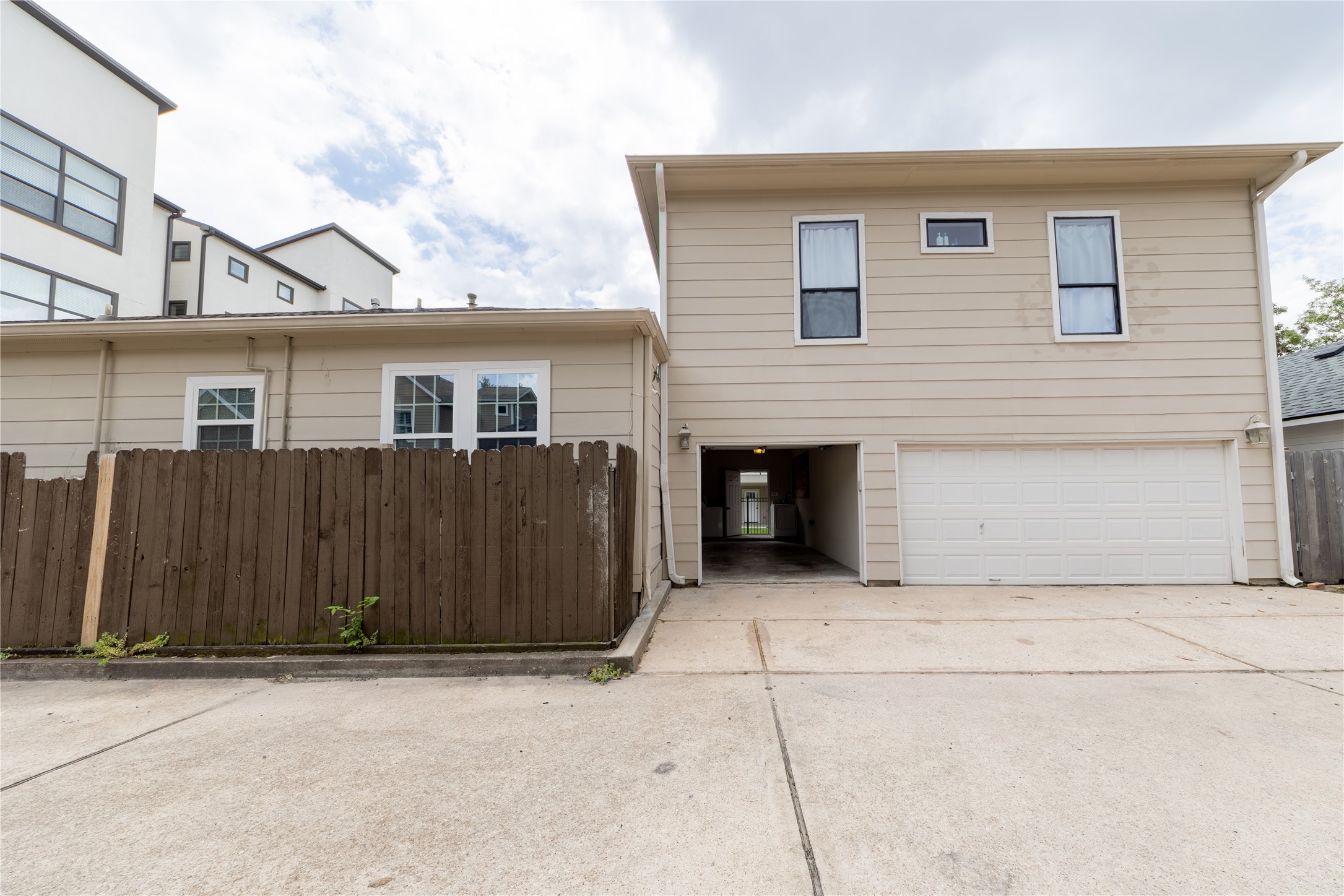 1229 West 21st Street Houston, TX 77008 - Photo 22 of 25 a front view of a house with wooden fence