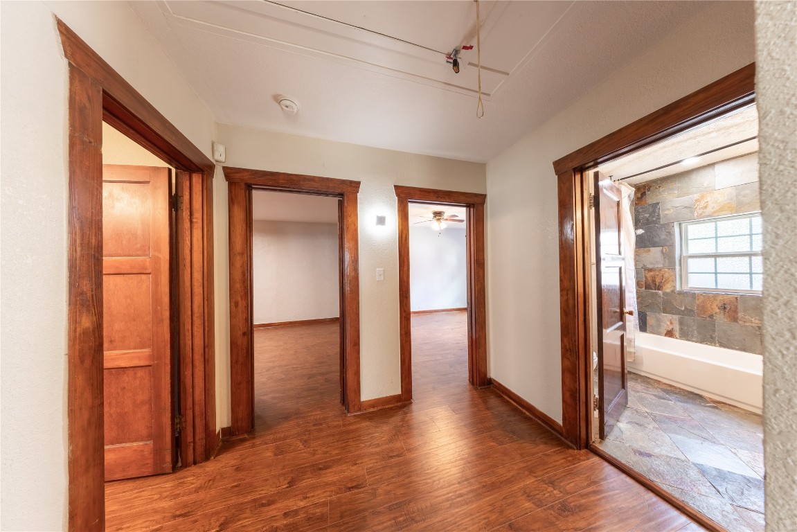 1229 West 21st Street Houston, TX 77008 - Photo 10 of 25 a view of a hallway with wooden floor and glass door