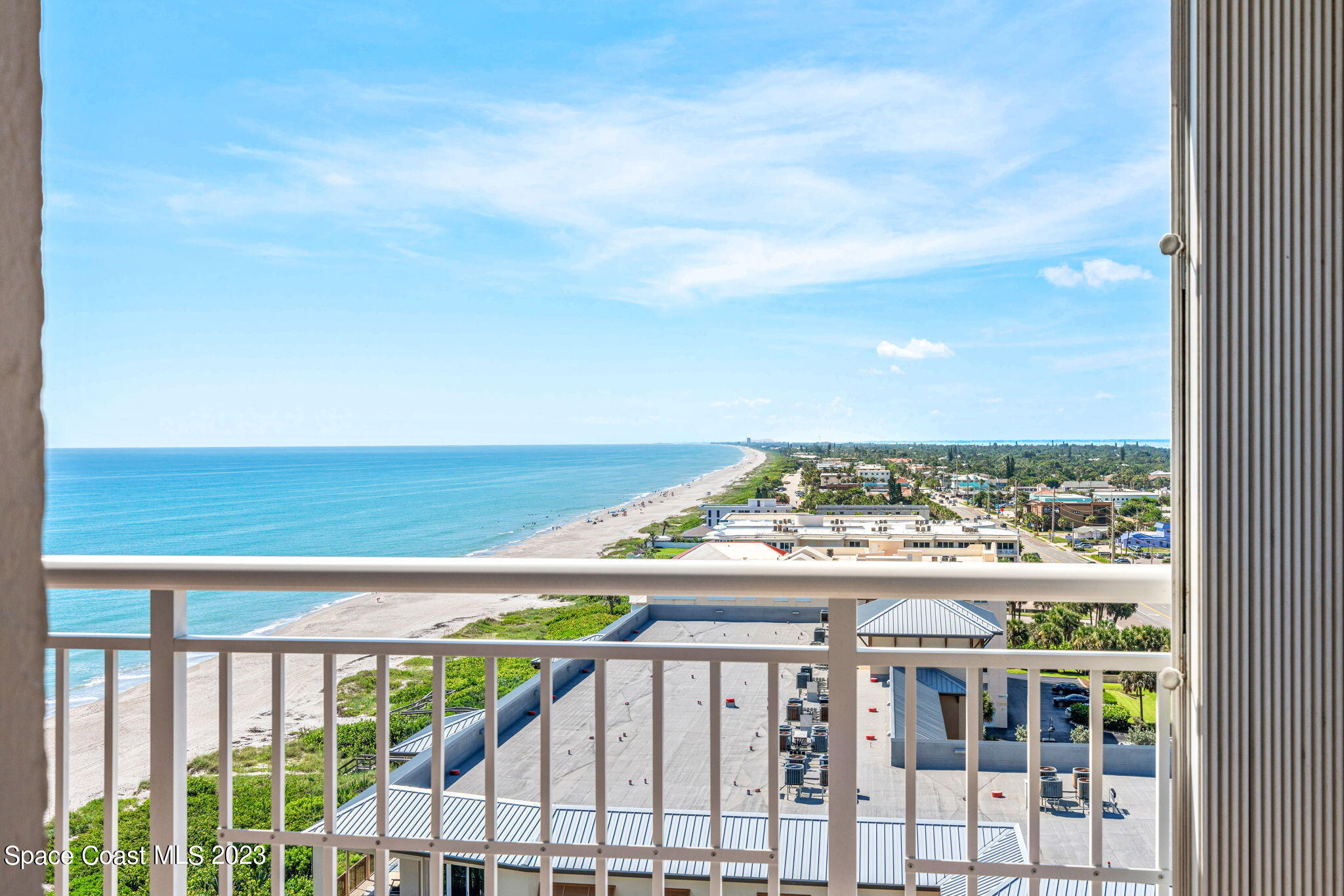 877 N Highway, Unit 1304 Indialantic, FL 32903 - Photo 16 of 24 a view of a city from a balcony