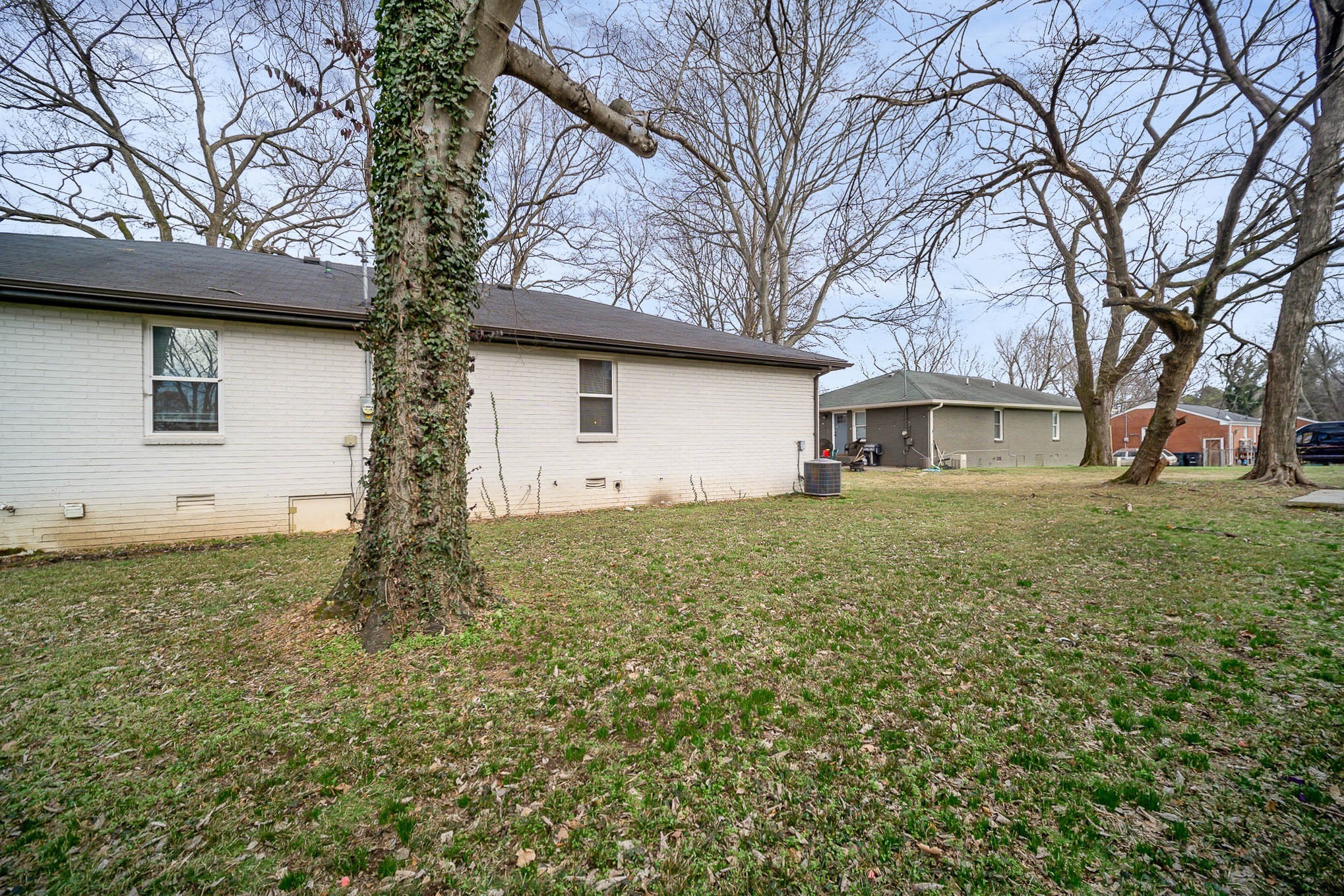 79 Lyle Lane Nashville, TN 37210 - Photo 20 of 25 a house with trees in front of it