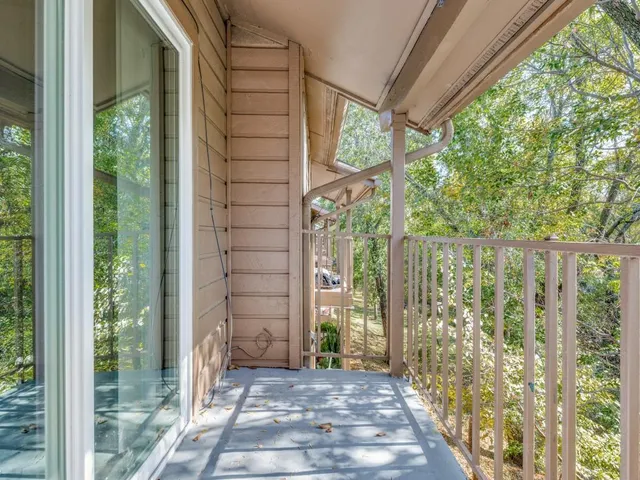 a view of a room with windows