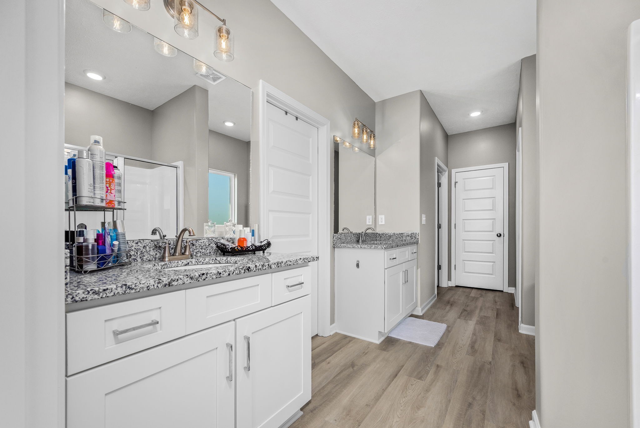 64 North Fork Branch Road Tullahoma, TN 37388 - Photo 27 of 49 a bathroom with a double vanity sink and a mirror