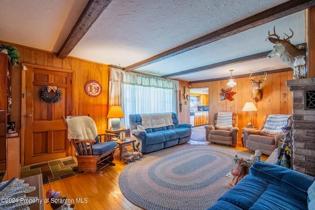 a room with furniture and a chandelier