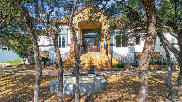 a view of yard along with trees