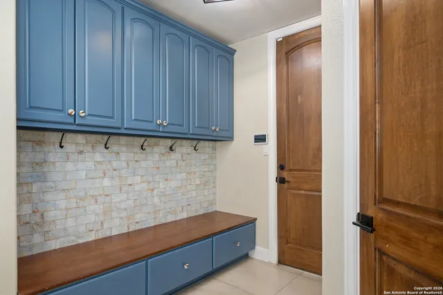 a view of hallway with washer and dryer