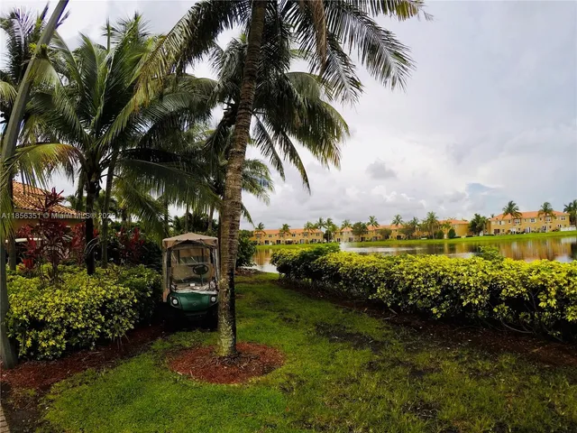 a view of a lake with a building in the background