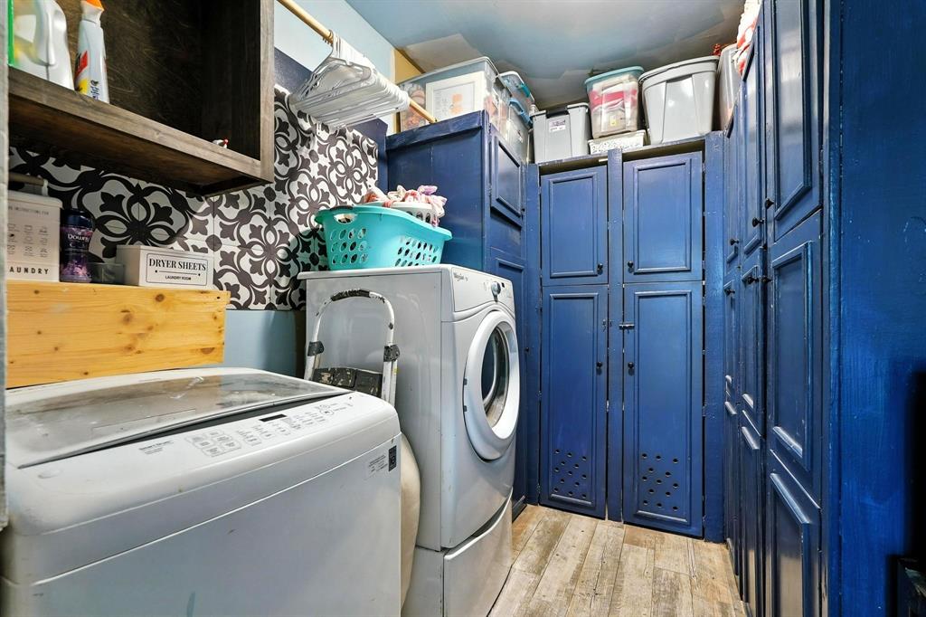 1017 Northwest 2nd Street Hamlin, TX 79520 - Photo 18 of 29 a utility room with dryer and washer