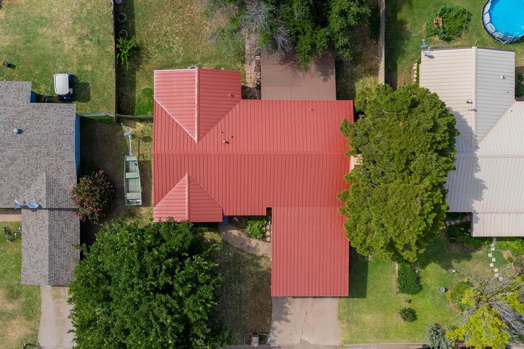 1017 Northwest 2nd Street Hamlin, TX 79520 - Photo 26 of 29 an aerial view of a house with a yard basket ball court and outdoor seating