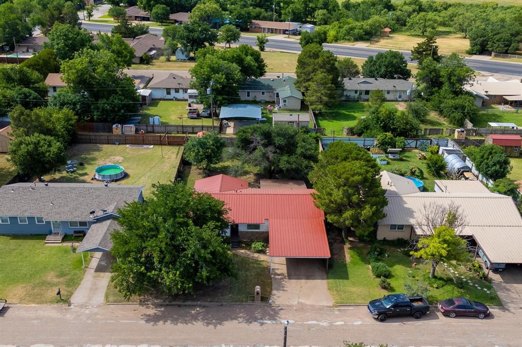 1017 Northwest 2nd Street Hamlin, TX 79520 - Photo 29 of 29 an aerial view of a house with a garden