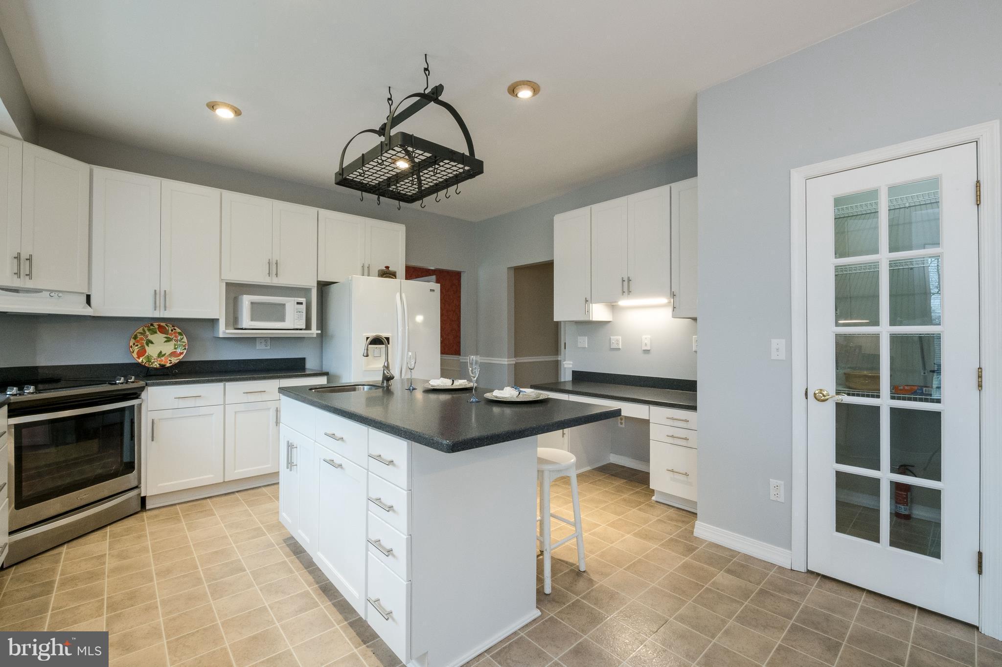 124 Chews Manor Road Stevensville, MD 21666 - Photo 13 of 30 Kitchen with walk-in pantry and desk area