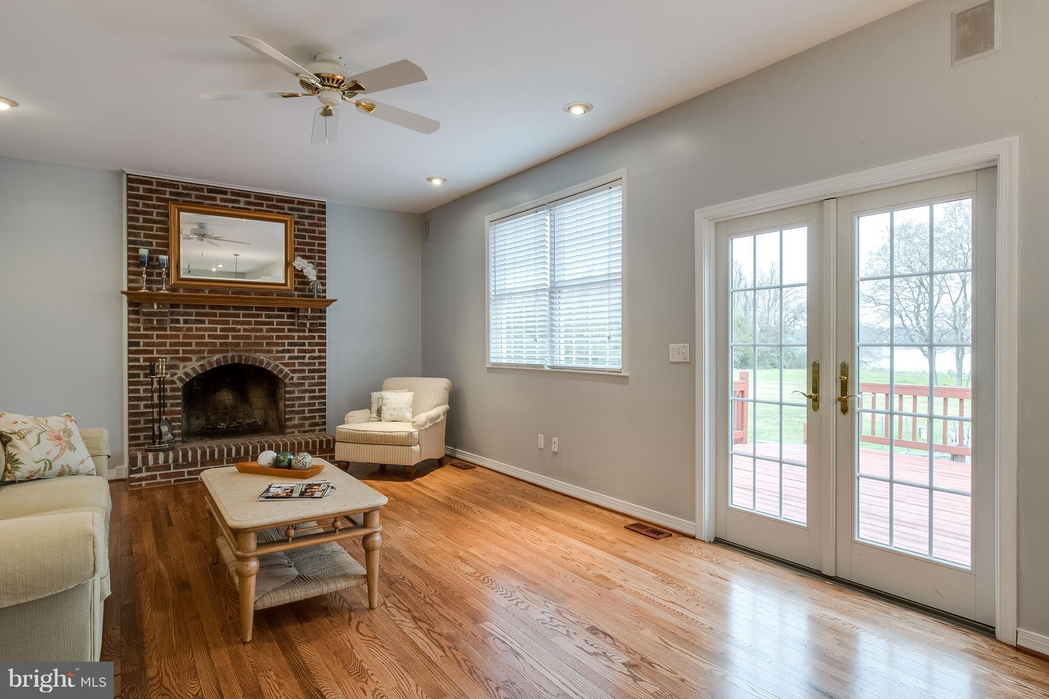 124 Chews Manor Road Stevensville, MD 21666 - Photo 17 of 30 French doors open to deck, pool, and waterfront