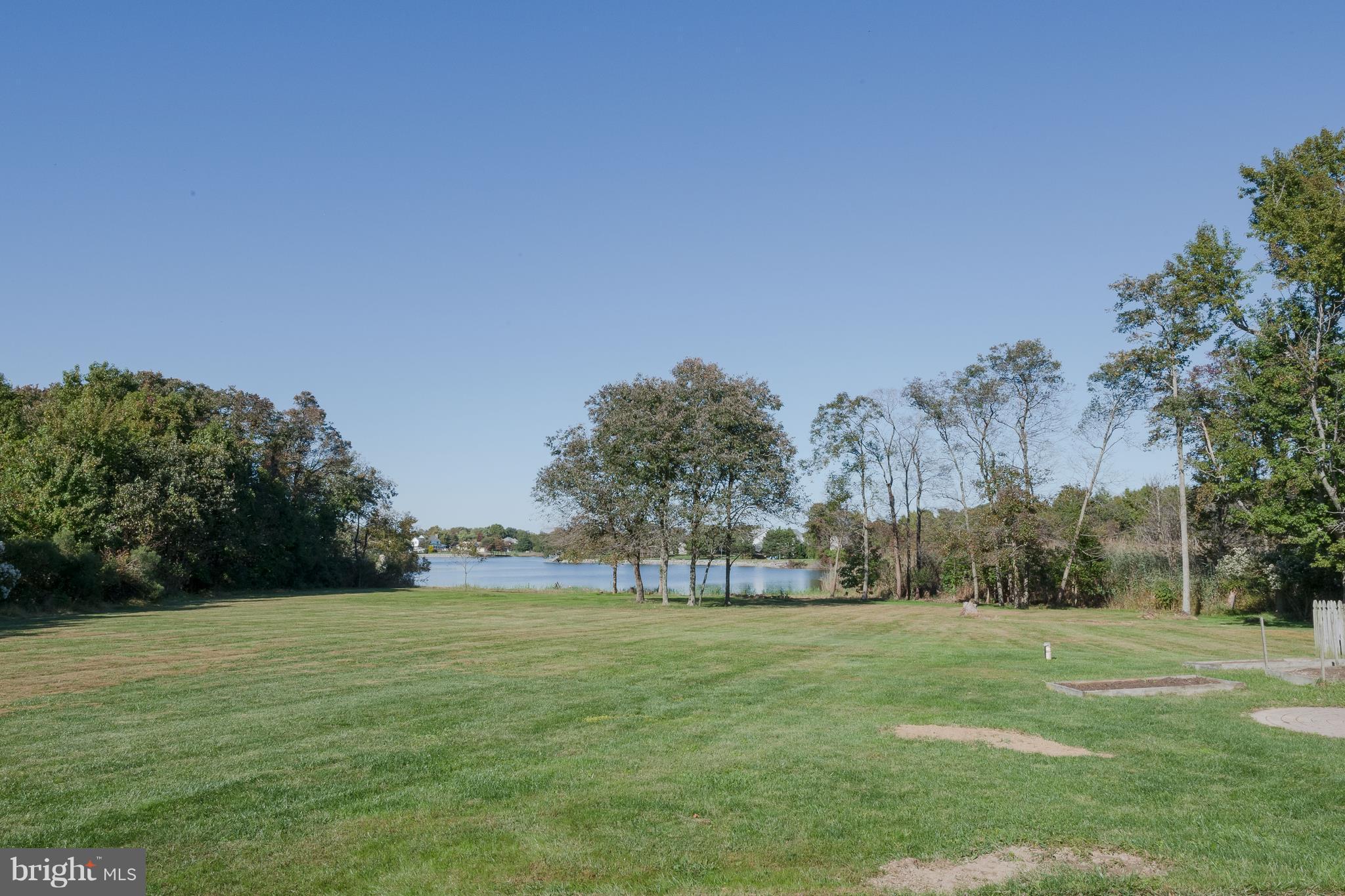 124 Chews Manor Road Stevensville, MD 21666 - Photo 29 of 30 Back yard with water and tree views