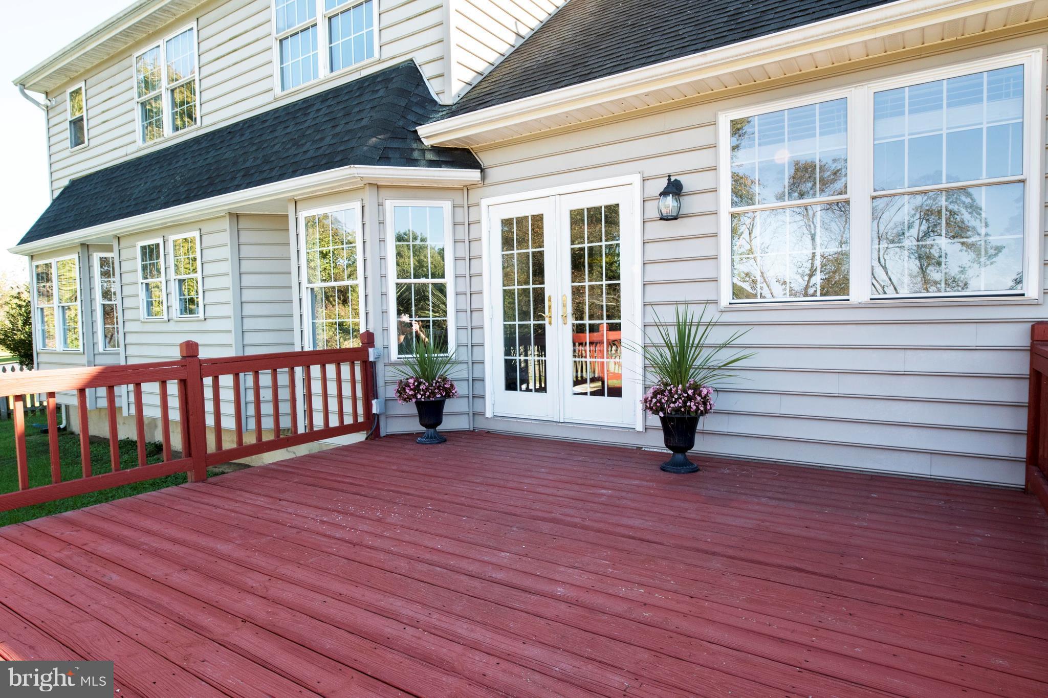 124 Chews Manor Road Stevensville, MD 21666 - Photo 5 of 30 Large wood deck great for entertaining