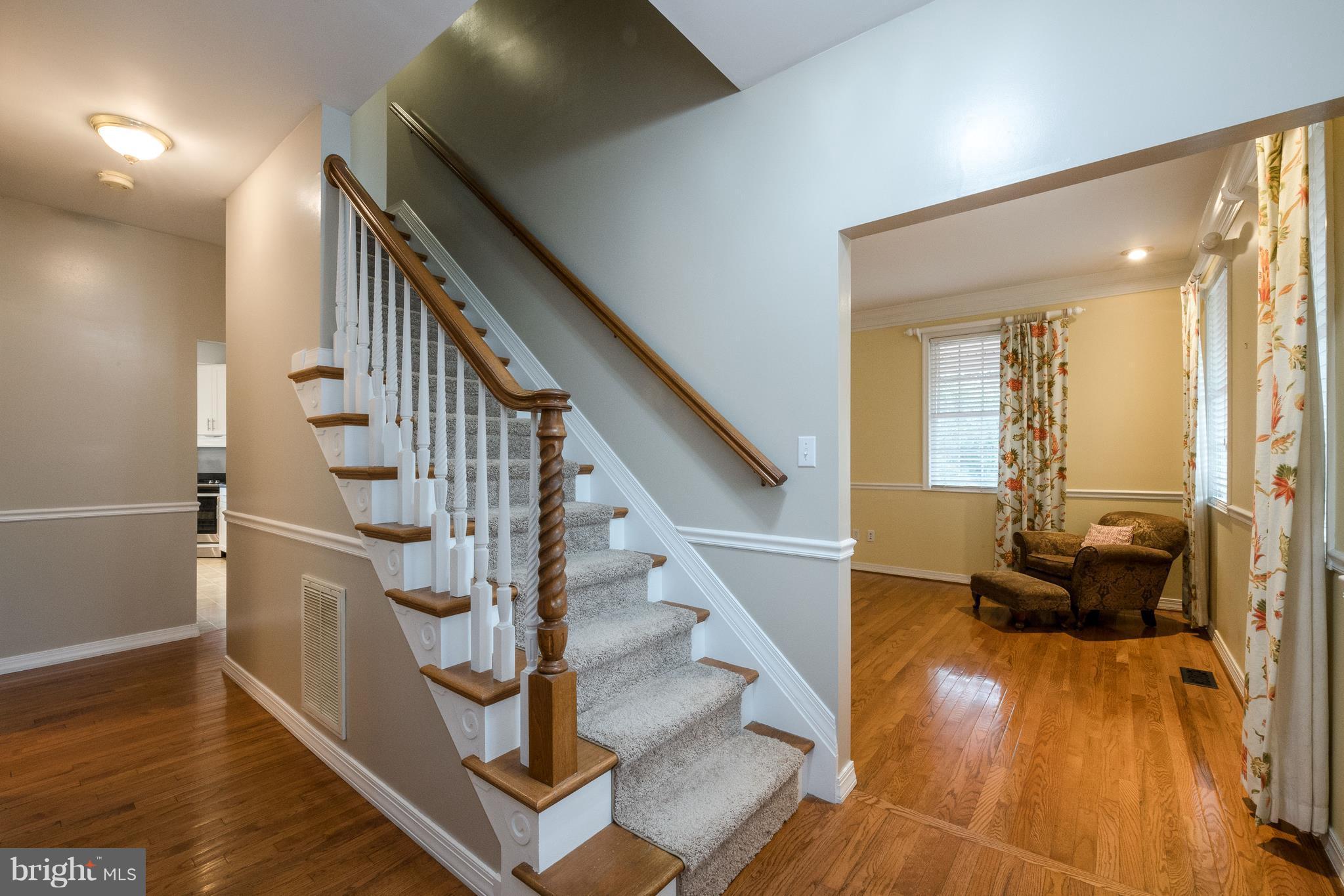 124 Chews Manor Road Stevensville, MD 21666 - Photo 7 of 30 Foyer leading to stairway