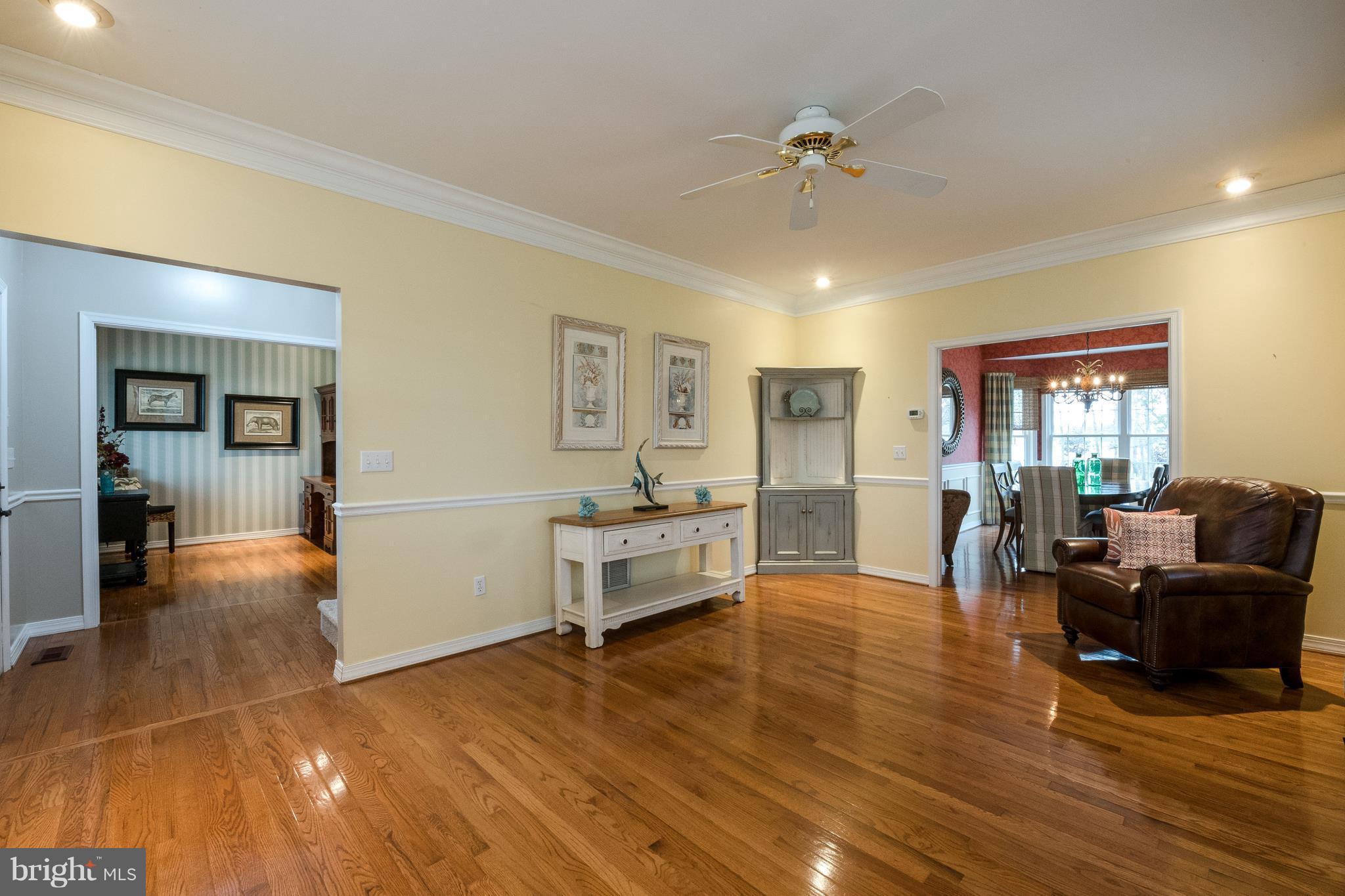 124 Chews Manor Road Stevensville, MD 21666 - Photo 8 of 30 Chair and crown moldings plus hardwood floors