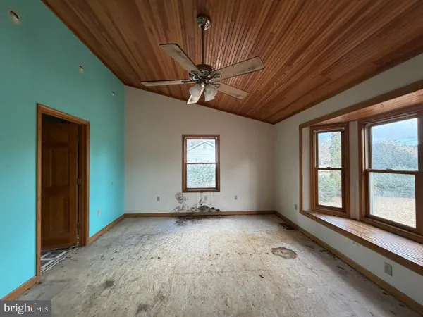 an empty room with windows